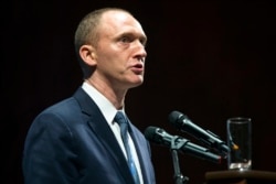 FILE - In this July 8, 2016, photo, Carter Page, then an adviser to U.S. Republican presidential candidate Donald Trump, speaks at the graduation ceremony for the New Economic School in Moscow, Russia.
