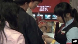 Supporters of Pakistani religious party Jamiat-e-ulema-e-Islam are seen near an image of al-Qaeda leader Osama bin Laden during an anti-U.S. rally on the outskirts of Quetta May 6, 2011 (Reuters).