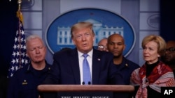 President Donald Trump speaks during a briefing about the coronavirus in the James Brady Press Briefing Room of the White House, March 15, 2020, in Washington.
