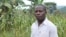 Edie Mukiibi, the new vice president of Slow Food International, at a school garden he helped create in Mukono, Uganda, July 22, 2014. (Hilary Heuler/VOA)