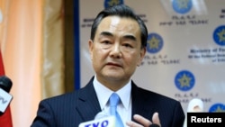China's Foreign Minister Wang Yi addresses a news conference during his official visit to Ethiopia's capital Addis Ababa, Jan. 6, 2014. 