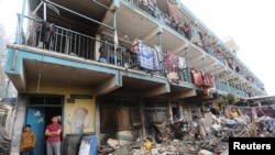 Последици од израелски напад врз училиште во кое се сместени раселените луѓе во централниот дел на појасот Газа