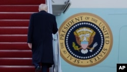 President Donald Trump walks up the stairs of Air Force One at Joint Base Andrews, Md., March 7, 2025.