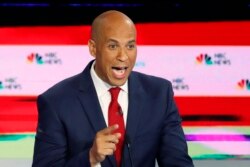 FILE - Democratic presidential candidate Sen. Cory Booker, D-N.J., speaks during a Democratic primary debate hosted by NBC News at the Adrienne Arsht Center for the Performing Art, in Miami, June 26, 2019.