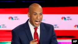 FILE - Democratic presidential candidate Sen. Cory Booker, D-N.J., speaks during a Democratic primary debate hosted by NBC News at the Adrienne Arsht Center for the Performing Art, in Miami, June 26, 2019.