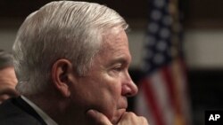 US Secretary of Defense Robert Gates listens to remarks at a Senate Armed Services Committee hearing on the "Defense Authorization Request for FY2012" in Washington, Feb. 17, 2011.