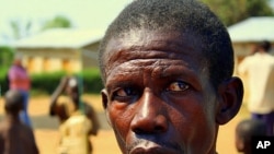 Antoine, a farmer, says he has lived near the park for three years, and has trouble feeding his family because animals raid his crops