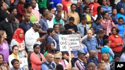 People rally at a peace march against xenophobia in Durban, South Africa, April 16, 2015. 
