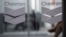 FILE - Chevron Global Technology Services Company logos are seen at an administrative office in Caracas, Venezuela, on Nov. 29, 2022. 