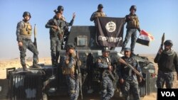 عراقي ځواکونه د موصل د بشپړه نیولو له اعلان دمخه خپل بریالیتوب لمانځي