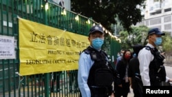 香港2021年12月19日举行立法会选举，警方加强戒备（路透社）