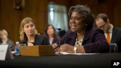 U.S. Assistant Secretary of State for African Affairs Linda Thomas-Greenfield, right, accompanied by USAID Assistant Administrator for Bureau for Democracy Conflict and Humanitarian Assistance Nancy Lindborg, testifies on Capitol Hill, Jan. 9, 2014, before the Senate Foreign Relations Committee hearing on situation in South Sudan. 
