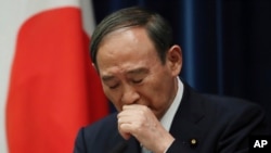 Japanese Prime Minister Yoshihide Suga holds a news conference at his office in Tokyo, Thursday, Sept. 9, 2021. Japan announced Thursday it is extending a coronavirus state of emergency in Tokyo and 18 other areas until the end of September as…