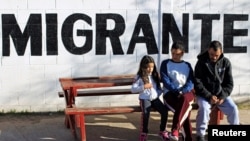 Adimar de Clavarlho Silha, his wife Maria Aparecida Cavarlho Silha and their daughter, a Brazilian family sent to a shelter in Ciudad Juarez while waiting for a court hearing in the U.S. regarding their asylum request, are pictured on Jan. 30, 2020.