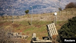 FILE - An Iron Dome anti-missile system is seen near the border area between Israel and Syria, in the Israeli-occupied Golan Heights, Nov. 18, 2020. 