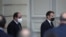 French President Emmanuel Macron, right, and Egyptian President Abdel-Fattah el-Sissi arrive for a joint news conference at the Elysee palace, in Paris, France, Dec. 7, 2020.