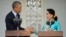 U.S. President Barack Obama, left, and Myanmar's opposition leader Aung San Suu Kyi shake hands during a news conference at her home in Yangon, Myanmar, Nov. 14, 2014.