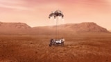 Perseverance rover is shown to be lowered to Martian surface 