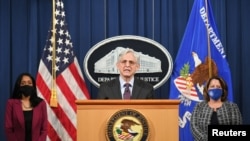 FILE - U.S. Attorney General Merrick Garland speaks at the Department of Justice in Washington, April 26, 2021.