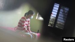 FILE - An HIV-positive patient rests at the Khmer-Soviet Hospital in Phnom Penh, Nov. 29, 2011.