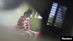 FILE - An HIV-positive patient rests at the Khmer-Soviet Hospital in Phnom Penh, Nov. 29, 2011.