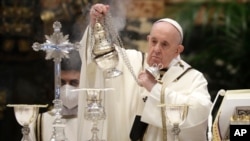 Pope Francis celebrates a Chrism Mass inside St. Peter's Basilica, at the Vatican, April 1, 2021.