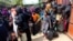 FILE - Rohingya refugees collect aid supplies including food and medicine, sent from Malaysia, at Kutupalang Unregistered Refugee Camp in Cox’s Bazar, Bangladesh, Feb. 15, 2017.