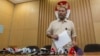 FILE - Bambang Widjojanto, former deputy chief of the Corruption Eradication Commission (KPK), is seen addressing the media in Jakarta.