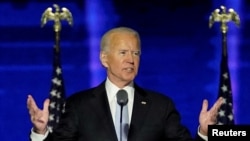 Democratic 2020 U.S. presidential nominee Joe Biden addresses supporters at an election rally, after news media announced that Biden has won the 2020 U.S. presidential election, in Wilmington, Delaware, Nov. 7, 2020.