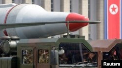 FILE - A North Korean military vehicle is seen carrying a missile during a parade in Pyongyang.