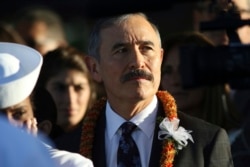 FILE - Retired Adm. Harry Harris, currently the U.S. Ambassador to South Korea, attends a ceremony at Pearl Harbor, Hawaii, Dec. 7, 2019.