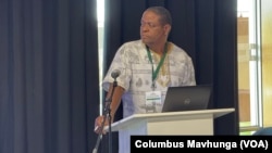 Charles Chikunda, UNESCO’s officer for climate education in southern Africa, speaks in Pretoria, South Africa, Dec. 3, 2024.