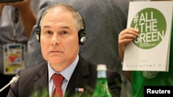 Environmental Protection Agency (EPA) Administrator Scott Pruitt attends during a summit of Environment ministers from the G7 group of industrialized nations in Bologna, Italy, June 11, 2017. But he left the summit before it ended.