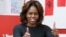 U.S. first lady Michelle Obama gestures during a language class for pre-school students at the Washington Yu Ying Public Charter School ahead of her upcoming trip to China, in Washington, March 4, 2014.