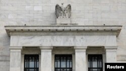 FILE - The Federal Reserve building is pictured in Washington, Aug. 22, 2018.