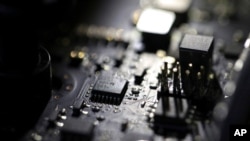 Foto ilustrasi bagian dalam sebuah komputer di Jersey City, 23 Juli 2019. Serangan ransomware melumpuhkan sekitar 200 perusahaan AS pada 2 Juli 2021, menurut penelitian.