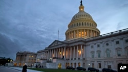 FILE - U.S. Capitol building in Washington at dusk.
