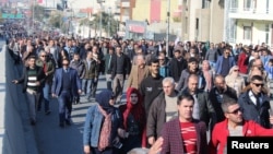 Kurdish protesters attend a rally against the Kurdish Regional Government (KRG) in Sulaimaniyah, Iraq, Dec. 18, 2017. 