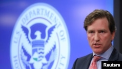 FILE - Chris Krebs, then the U.S. Department of Homeland Security Under Secretary, speaks to reporters in Arlington, Virginia, Nov. 6, 2018.