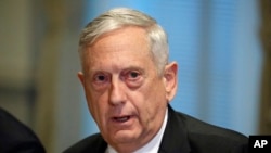 FILE - Defense Secretary Jim Mattis answers a question at the Pentagon, Oct. 19, 2017, near Washington. The Pentagon said March 9, 2018, that Mattis was in contact with the White House and involved in the decision to accept North Korean leader Kim Jong Un's offer of talks.