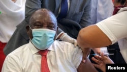 South African President Cyril Ramaphosa receives the Johnson and Johnson coronavirus disease vaccination at the Khayelitsha Hospital near Cape Town, South Africa, Feb. 17, 2021.