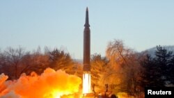A view of what state news agency KCNA reports is the test firing of a hypersonic missile at an undisclosed location in North Korea, Jan. 5, 2022