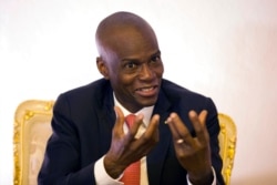 FILE - Haiti's President Jovenel Moise speaks during an interview in his office in Port-au-Prince, Haiti, Aug. 28, 2019.