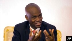 FILE - Haiti's late president, Jovenel Moise, is pictured during an interview in his office in Port-au-Prince, Aug. 28, 2019. Moise was assassinated July 7, 2021.