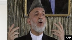 Tổng thống Karzai thúc đẩy thủ lãnh các bô tộc giúp bảo vệ làng xóm và ông cũng kêu gọi những phần tử nổi dậy buông vũ khí