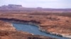 Low water levels at Wahweap Bay at Lake Powell along the Upper Colorado River Basin are shown Wednesday, June 9, 2021, at the Utah and Arizona border at Wahweap, Ariz. (AP/Ross D. Franklin)