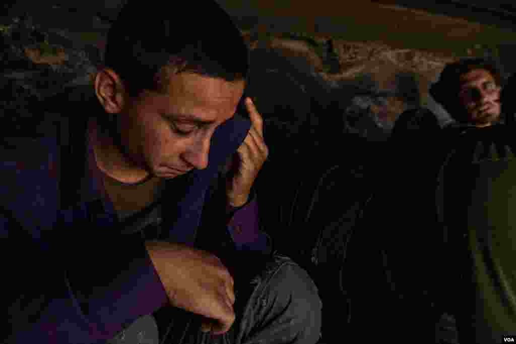 This Afghan boy's legs were torn up by barbed wire as he crossed the border from Iran into Turkey, but he is too afraid of arrest to seek medical help, in Van, Turkey, Sept. 1, 2021.