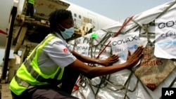 FILE - A shipment of COVID-19 vaccines distributed by the COVAX global initiative arrives in Abidjan, Ivory Coast, Feb. 25, 2021.