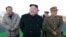 North Korean leader Kim Jong Un supervised a ballistic rocket launching drill of Hwasong artillery units of the Strategic Force of the KPA on the spot in this undated photo released by North Korea's Korean Central News Agency (KCNA) in Pyongyang, March 7, 2017.