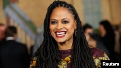 FILE - Director and executive producer Ava DuVernay poses at a screening of the film "Selma" during AFI Fest 2014 in Hollywood, California, Nov. 11, 2014. 